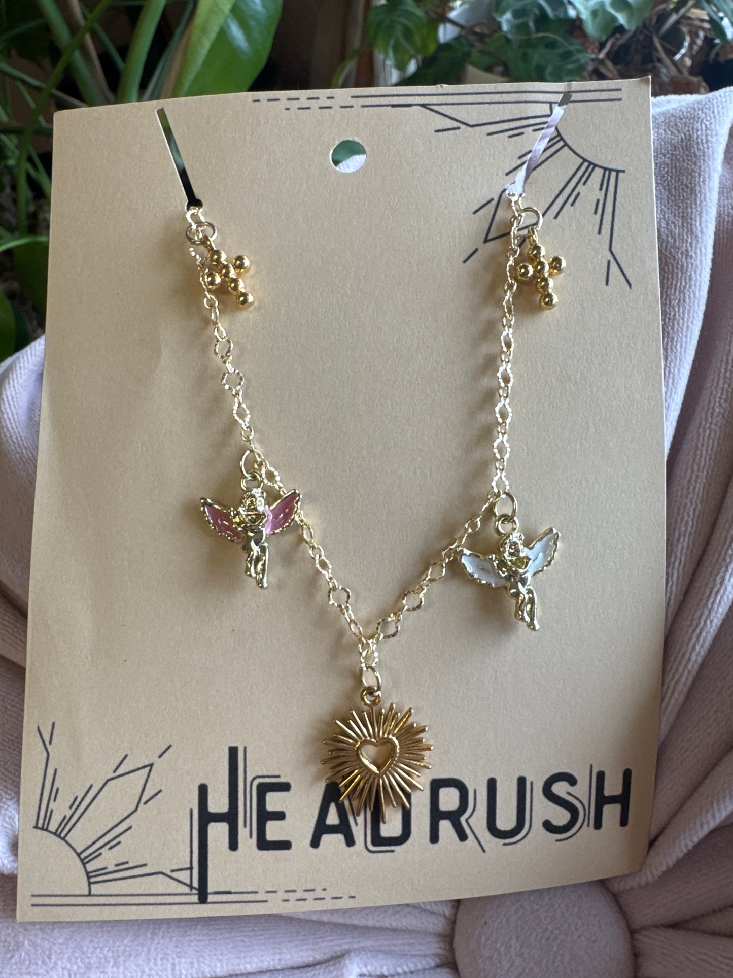 Gold Angel, Cross, and Heart Charm Necklace